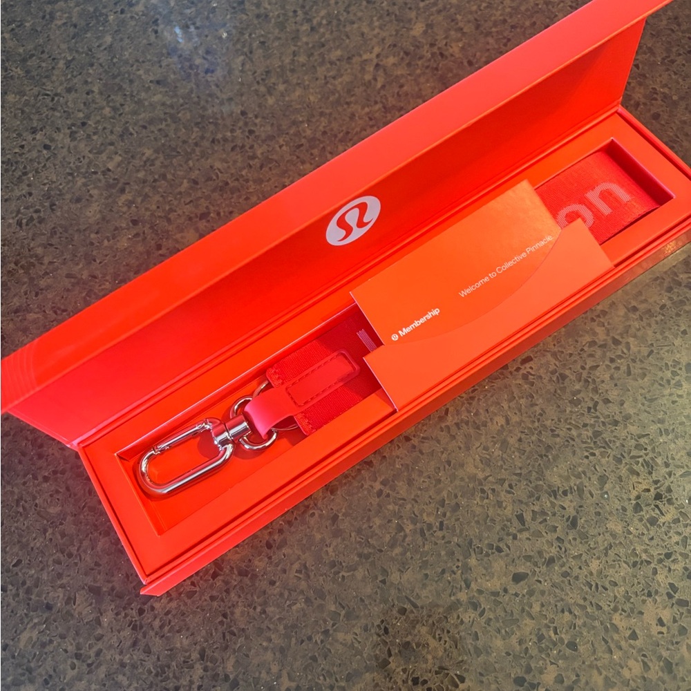 NIB lululemon athletica Red Membership Key Holder